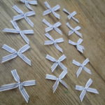 Blue and white trimming ribbon bows, 15 in a pack, dressmaking supplies and online haberdashery, pretty ribbon bows for sale, trimmings and accesories for sewing online shop at HandBound Costume Supplies