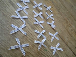 Blue and white trimming ribbon bows, 15 in a pack, dressmaking supplies and online haberdashery, pretty ribbon bows for sale, trimmings and accesories for sewing online shop at HandBound Costume Supplies