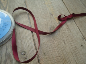Maroon red ribbon - Online Ribbon stockists, Spiral ribbon brand - col.30, historical costume trims and supplies, Period Clothing accesories, HandBound Historical Costumes supplies, Online fabric and ribbon shop