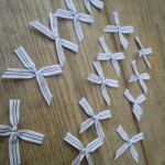 Blue and white trimming ribbon bows, 15 in a pack, dressmaking supplies and online haberdashery, pretty ribbon bows for sale, trimmings and accesories for sewing online shop at HandBound Costume Supplies