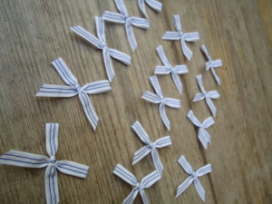 Blue and white trimming ribbon bows, 15 in a pack, dressmaking supplies and online haberdashery, pretty ribbon bows for sale, trimmings and accesories for sewing online shop at HandBound Costume Supplies