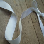 white satin ribbon 25mm wide - Online Haberdashery Supplies, Historical Looking Trims, natural ribbons for sale, berisford's rustic ribbon - dark cream col 50, Inline Historical Fabric suppliers, Hand made and Bespoke Historical Costumes based on items from the museums by HandBound Costumes,
