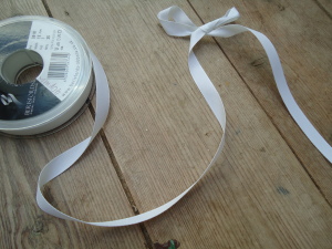 white 12mm Rustic Ribbon by Berisford Ribbons Suppliers, Online Haberdashery Supplies, Historical Looking Trims, natural ribbons for sale, berisford's rustic ribbon - dark cream col 50, Inline Historical Fabric suppliers, Hand made and Bespoke Historical Costumes based on items from the museums by HandBound Costumes,