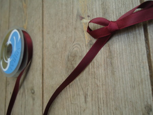 Maroon red ribbon - Online Ribbon stockists, Spiral ribbon brand - col.30, historical costume trims and supplies, Period Clothing accesories, HandBound Historical Costumes supplies, Online fabric and ribbon shop