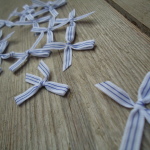 Blue and white trimming ribbon bows, 15 in a pack, dressmaking supplies and online haberdashery, pretty ribbon bows for sale, trimmings and accesories for sewing online shop at HandBound Costume Supplies