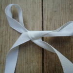 white 12mm Rustic Ribbon by Berisford Ribbons Suppliers, Online Haberdashery Supplies, Historical Looking Trims, natural ribbons for sale, berisford's rustic ribbon - dark cream col 50, Inline Historical Fabric suppliers, Hand made and Bespoke Historical Costumes based on items from the museums by HandBound Costumes,