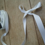 white 12mm Rustic Ribbon by Berisford Ribbons Suppliers, Online Haberdashery Supplies, Historical Looking Trims, natural ribbons for sale, berisford's rustic ribbon - dark cream col 50, Inline Historical Fabric suppliers, Hand made and Bespoke Historical Costumes based on items from the museums by HandBound Costumes,