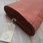 Rustic Red Wool mix fabric for sale, Online fabric Shop, historically accurate fabrics, re-enactment fabrics, I want to make a historical costume where so I get my fabrics?, pure cotton fabrics, online haberdashery, cotton lawn fabric with sheen, handBound Historical Costume fabrics supply, made to measure Historical costumes, custom made and bespoke period stays and corsetry