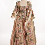 How to wear a sack back gown, replica hand made historical costumes by HandBound Costumes, furbelow trim, stomacher gown with silk, custom made costumes for reenactment and theatre and film