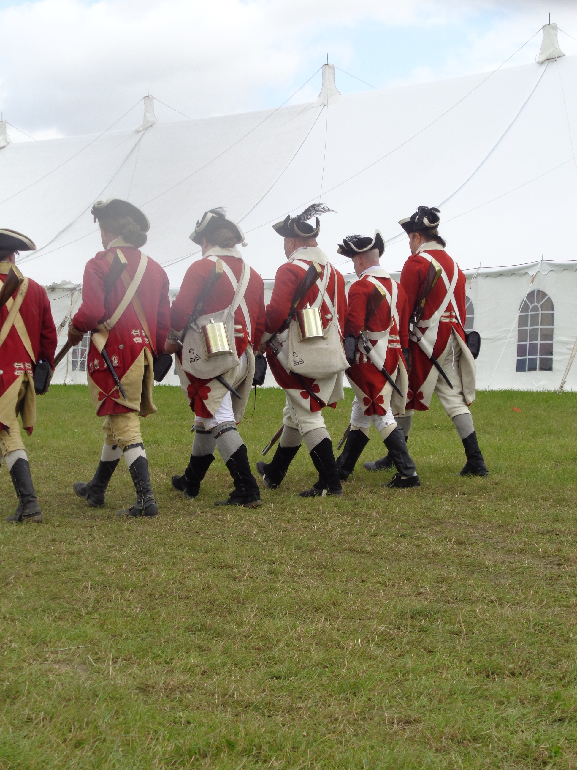 Soldiers in 18th c military uniform, handbound historical costumiers