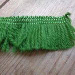 wool effect green short tassle, where can i get a rnage of tassle for sale, I need a tassle for a project I'm sewing i need an online haby, costume department shopping haby and trims