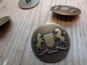 horse and shield coats of arms on brass button, online button shop, replica buttons for period costume,