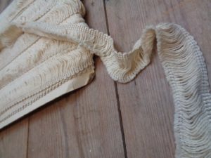 delicate wooly cream tassle trim, online haberdashery, dressmaking supplies - braids and trims, soft furnishing sewing stuff, cushion trims for sale