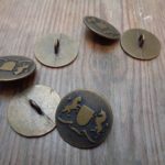 military style buttons, period drama trims and buttons,