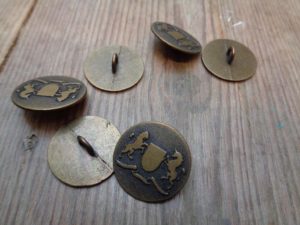 military style buttons, period drama trims and buttons,