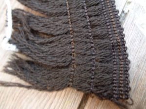 history reenactment haberdashery braids and trims, wollen looking tassles for cloaks and gowns, trims sold by the mtr - HandBound costumes and fabrics