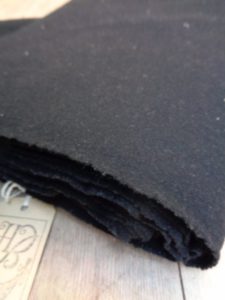 I need a uk based fabric shop that sells wools and linens online, reenactment materials suitable for historical costumes